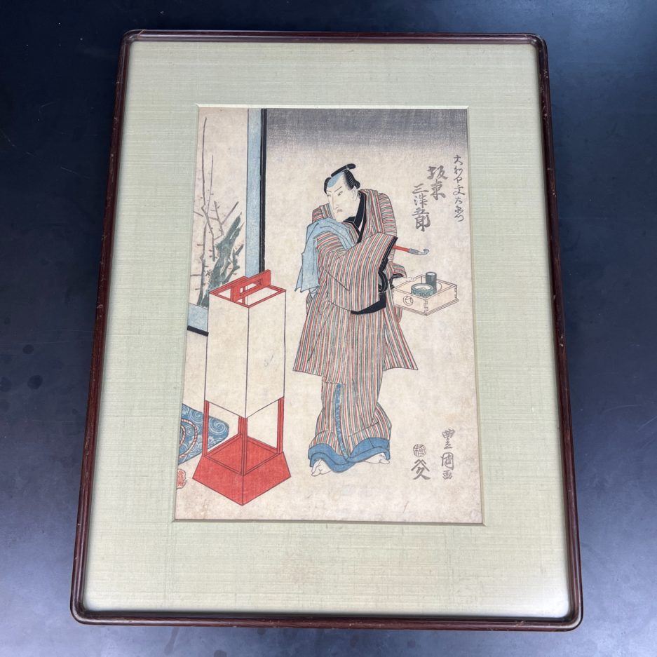 Estampe japonaise Toyokuni Kunisada Homme nécessaire à fumer