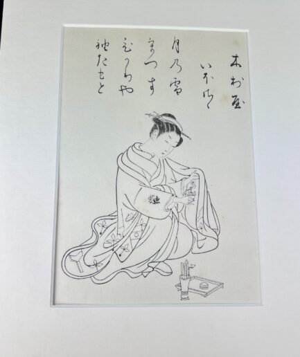 Estampe japonaise e-Hon représentant un femme occupée à lire - Meiji XIXe s.